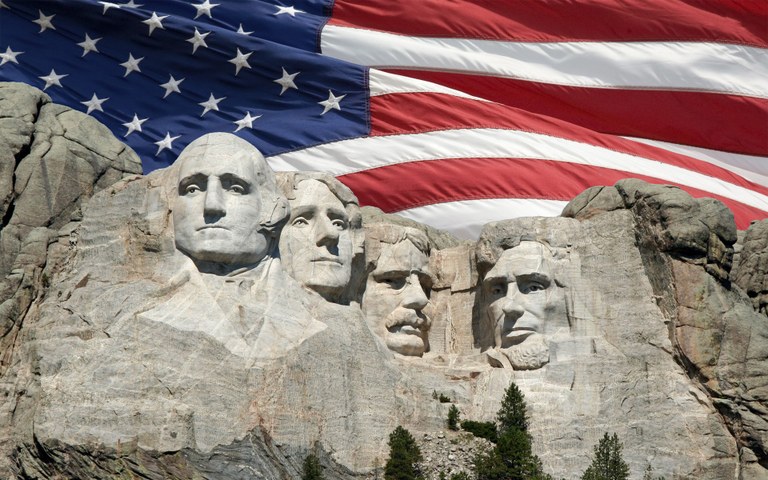 Mt. Rushmore with flag